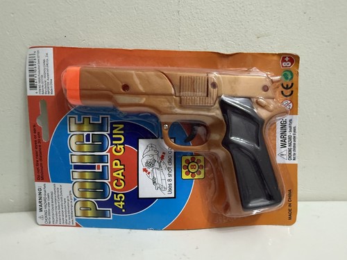 Toy cap guns comes with - cap,