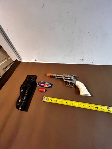 Toy cap pistol - cap, safety